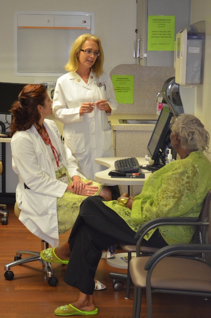 UTMB nurse practitioner Andrea Wirt with Dr. Elena Volpi, director of the Sealy Center on Aging with UTMB patient Gloria Ellisor